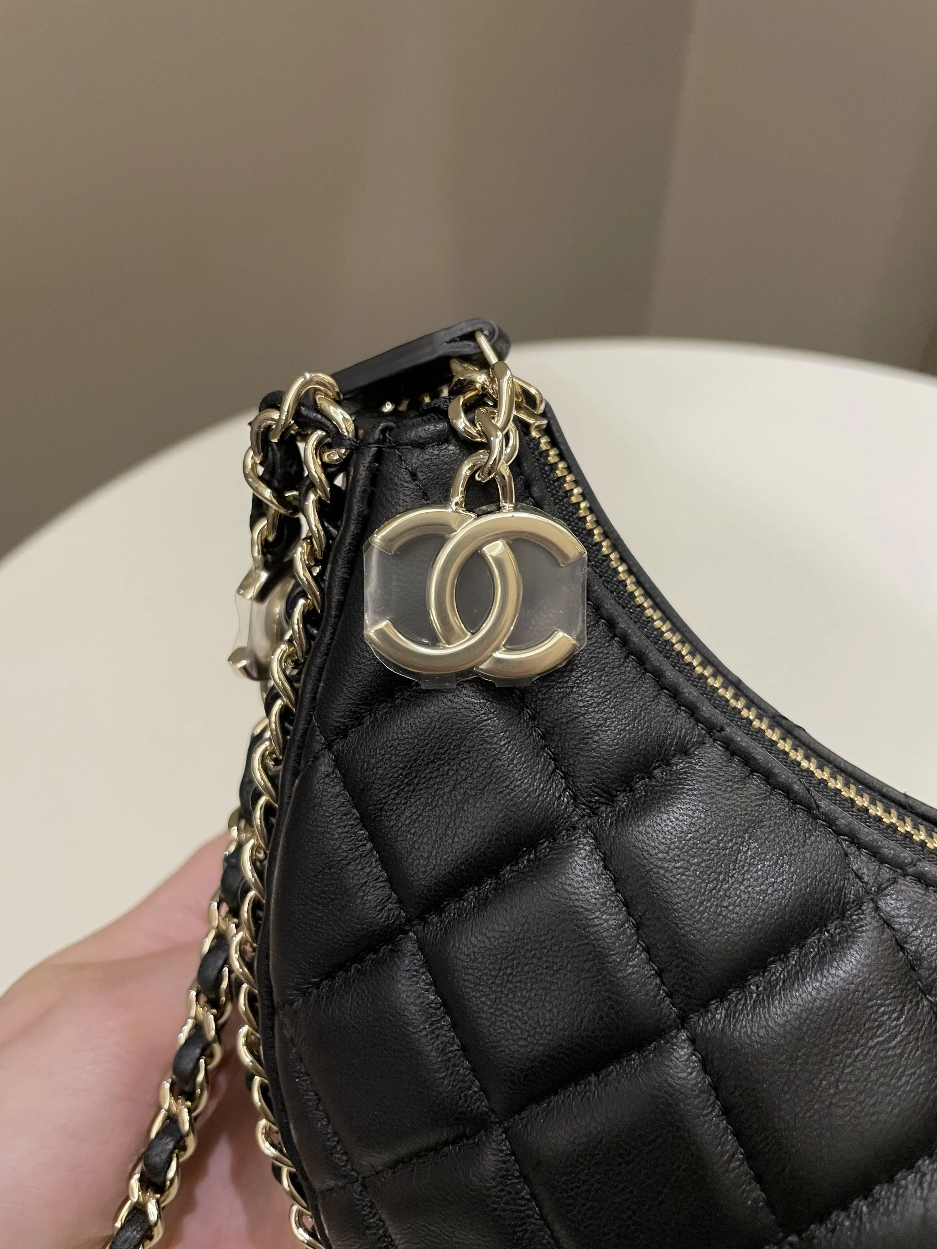 Chanel 23P Quilted Chain Around Hobo Bag Black Lambskin