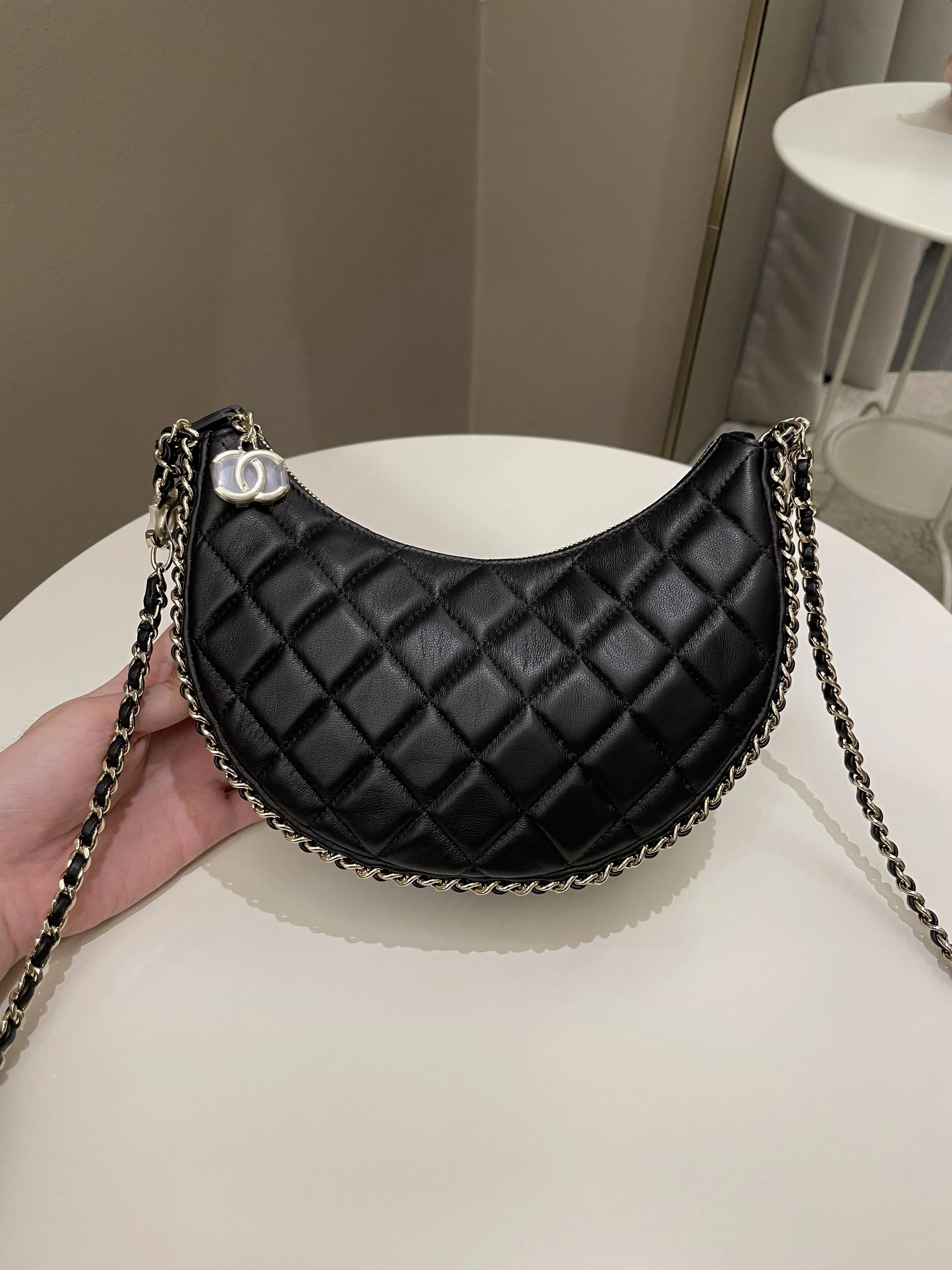 Chanel 23P Quilted Chain Around Hobo Bag Black Lambskin
