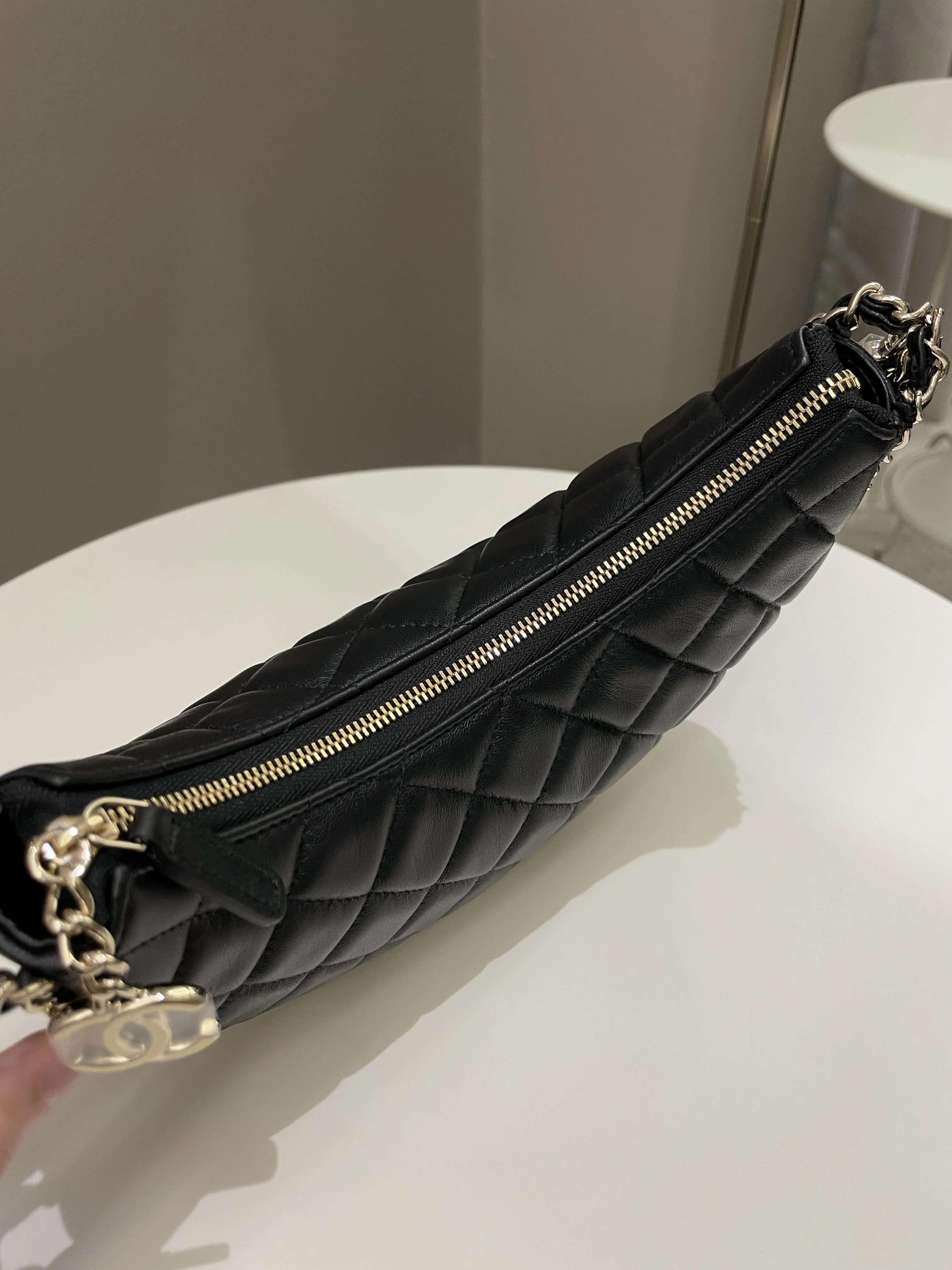 Chanel 23P Quilted Chain Around Hobo Bag Black Lambskin