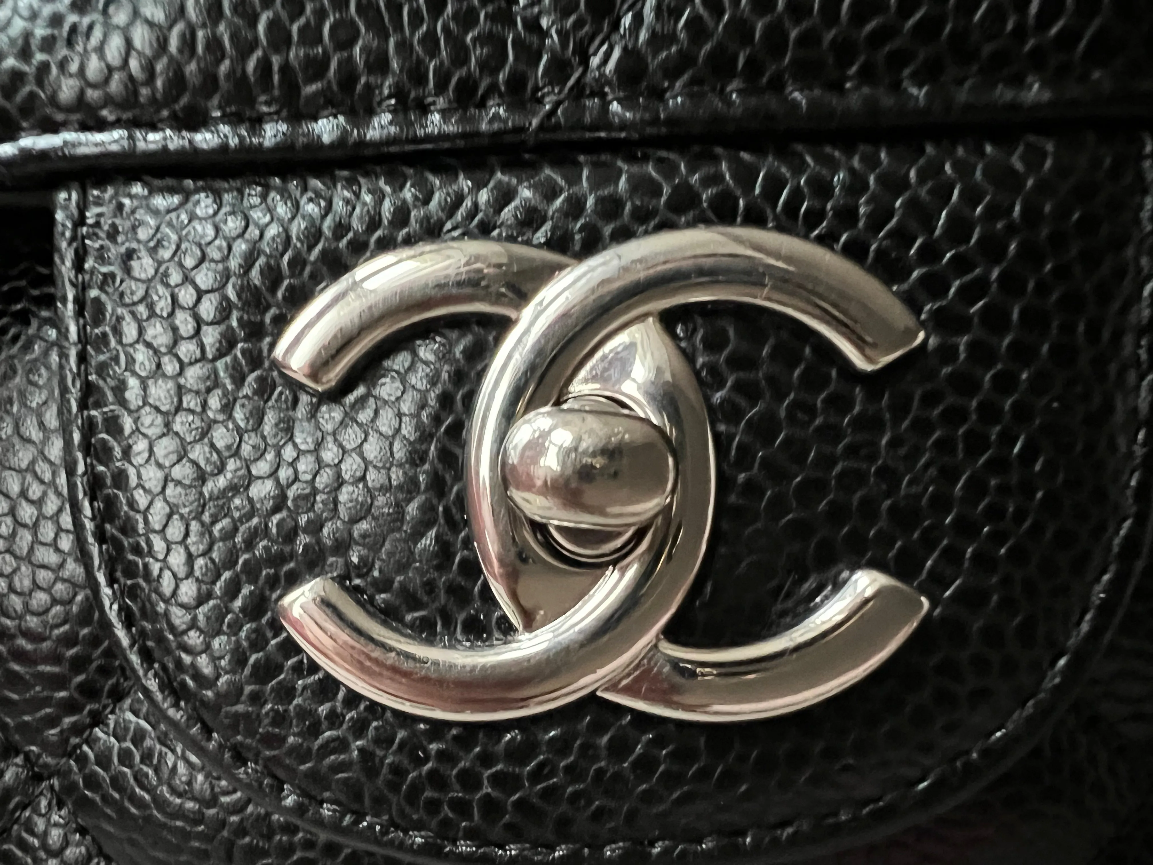 Chanel Maxi Double Flap in Black Caviar