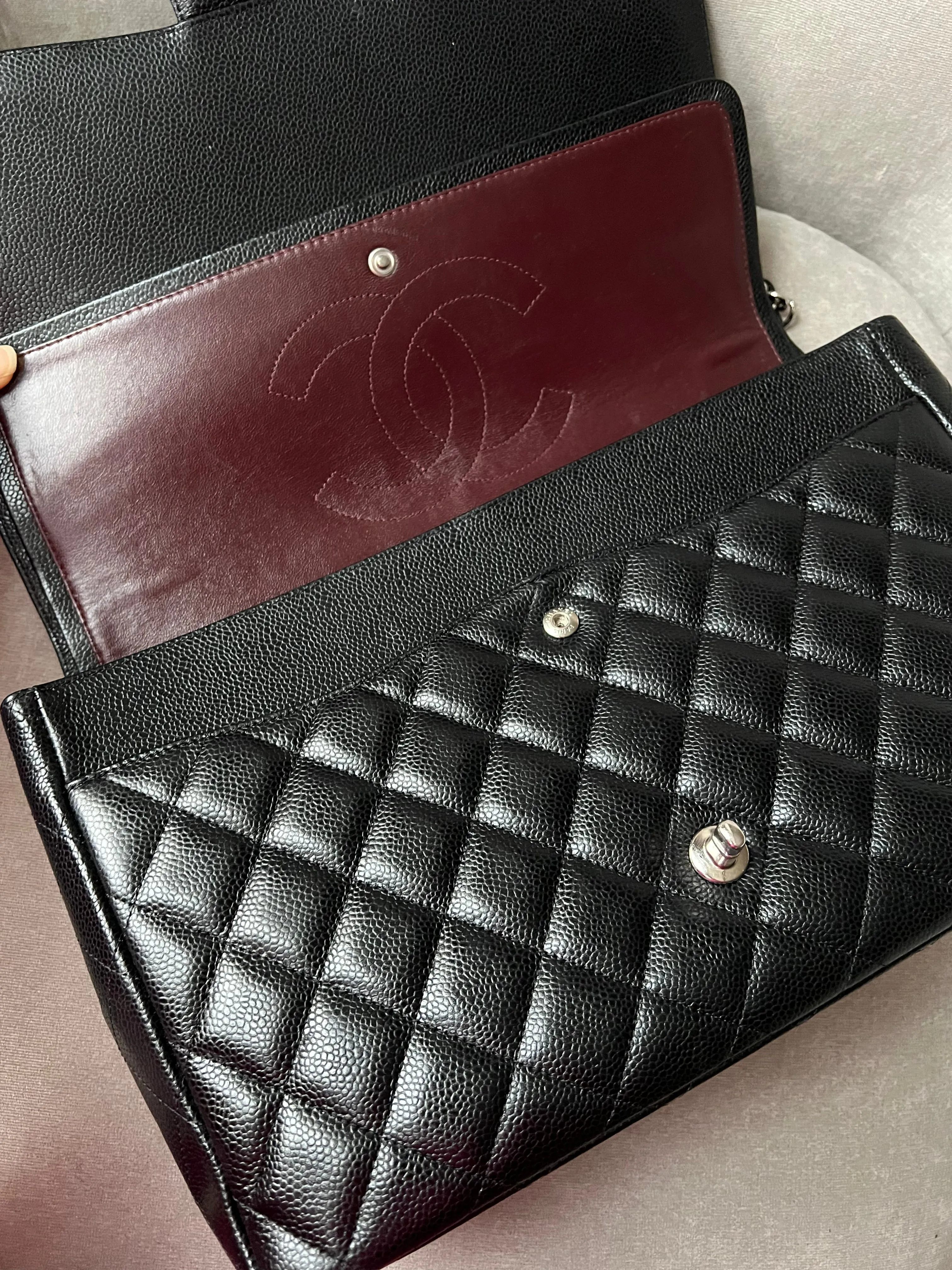 Chanel Maxi Double Flap in Black Caviar