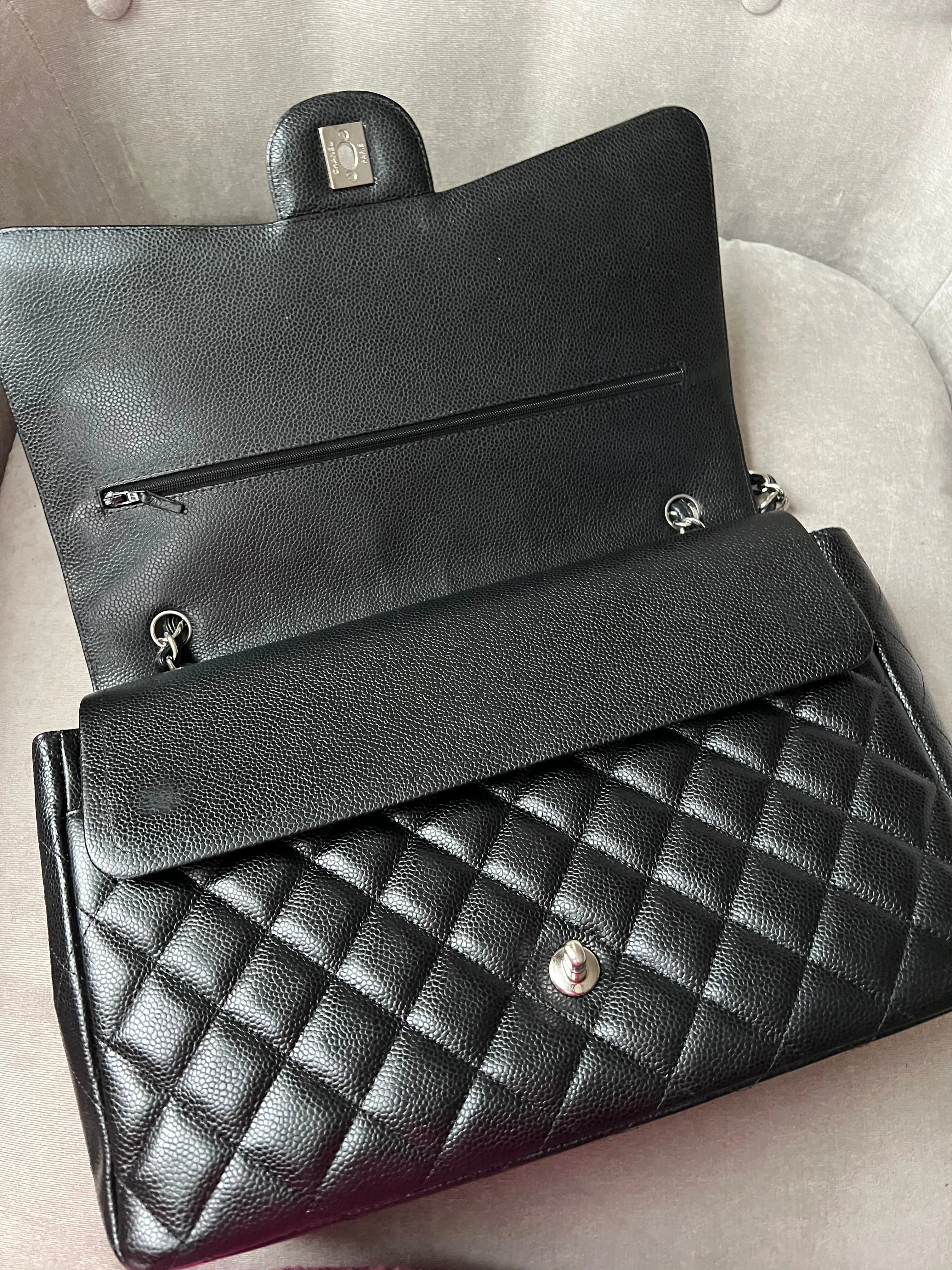 Chanel Maxi Double Flap in Black Caviar
