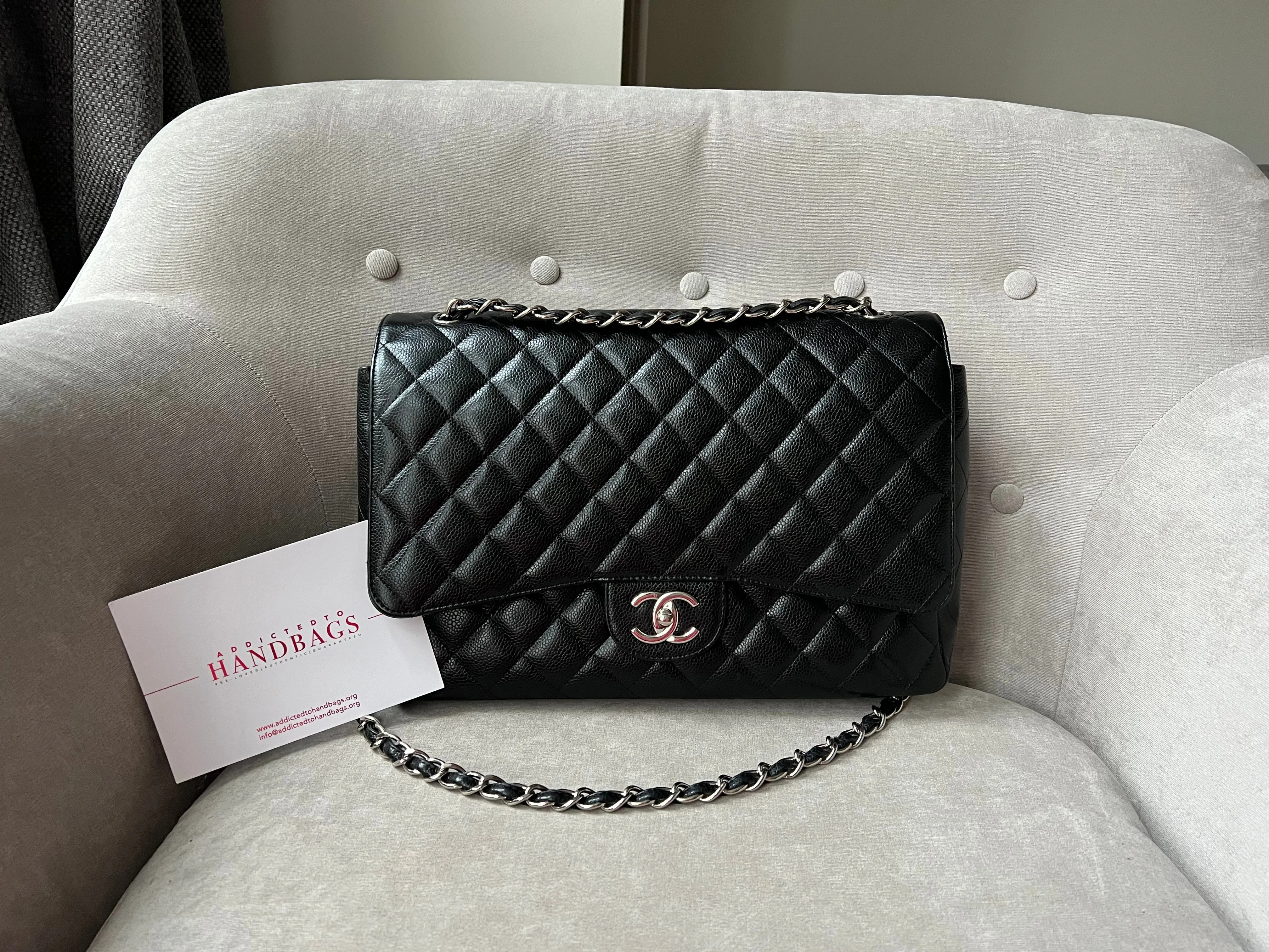 Chanel Maxi Double Flap in Black Caviar