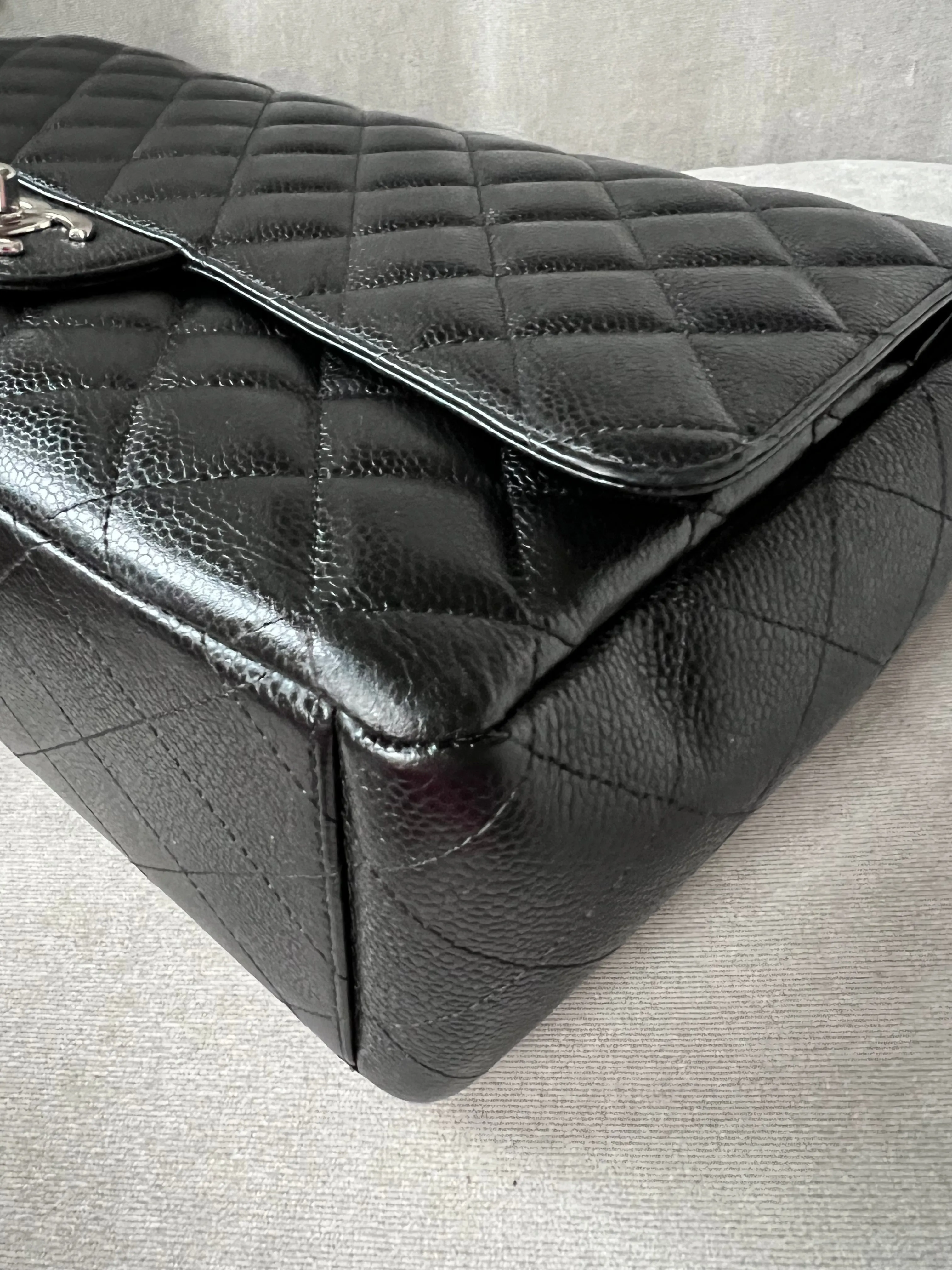 Chanel Maxi Double Flap in Black Caviar